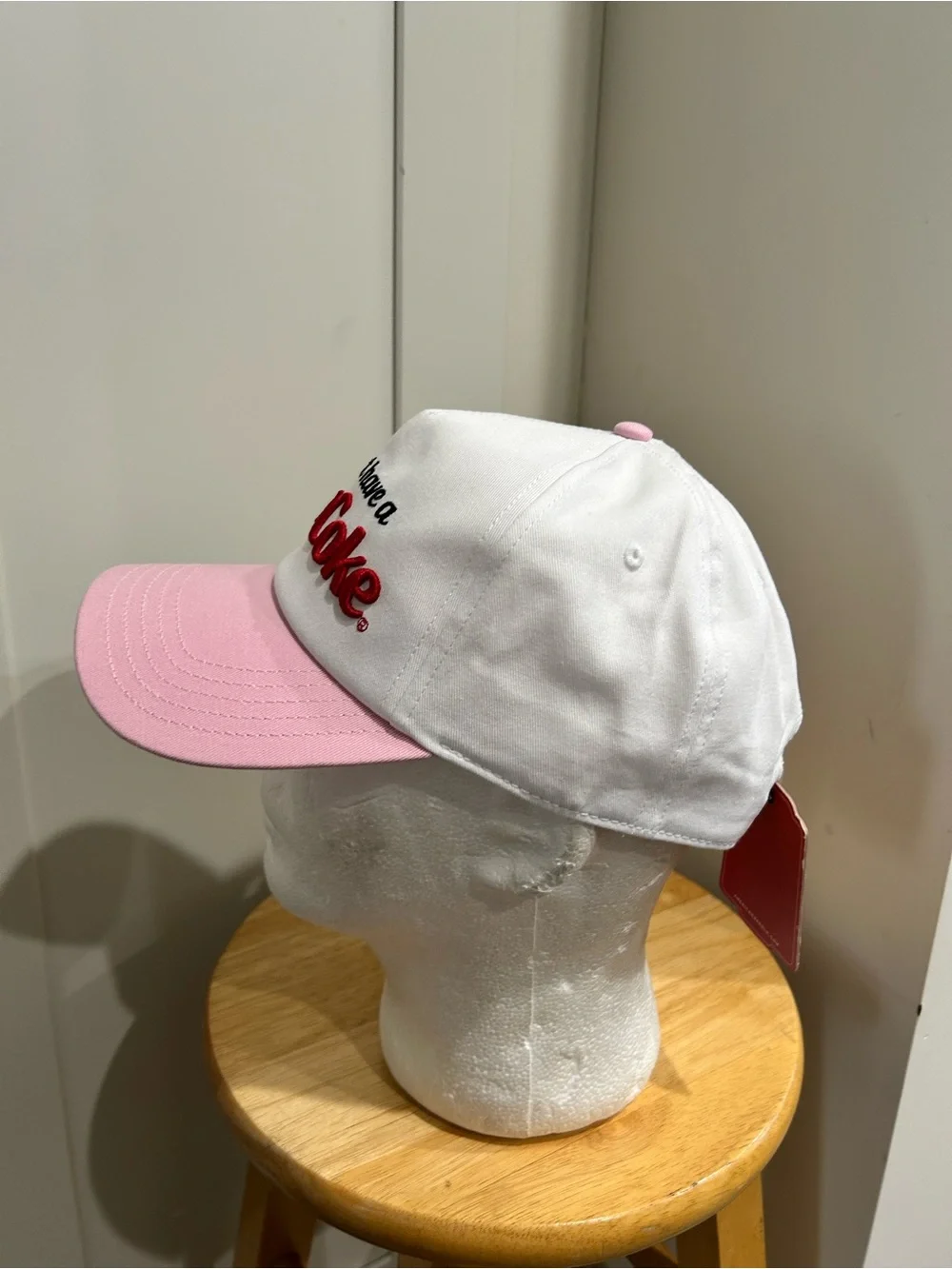 American Needle White Trucker Hat with Pink Bill and Red Embroidery